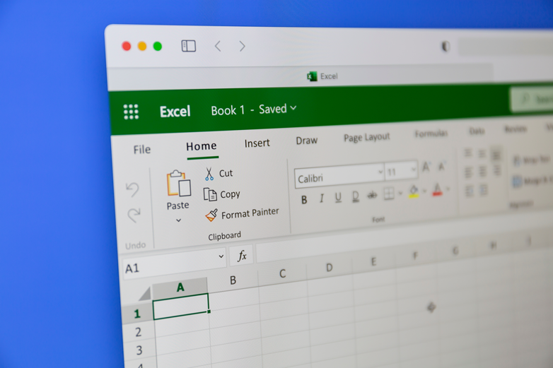 Open spreadsheet on laptop using Microsoft Excel program.